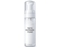 A clear cylindrical bottle of teeth whitening foam with a white pump dispenser and black text reading 'TEETH WHITENING FOAM' on a clean white background.